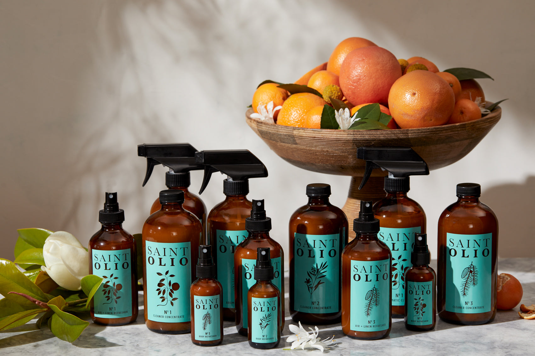 Saint Olio natural cleaning collection — plant-based cleaner concentrate, air and linen refresher, and body sprays