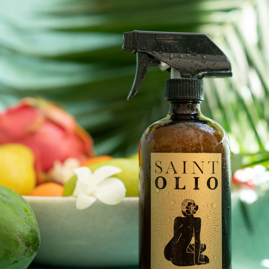 Saint Olio Cala Aromatic Cleaner in an amber trigger-spray bottle with guava